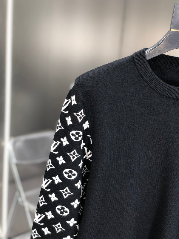 Close-up detail shot of Louis Vuitton luxury clothing with tailored silhouette