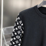 Close-up detail shot of Louis Vuitton luxury clothing with tailored silhouette