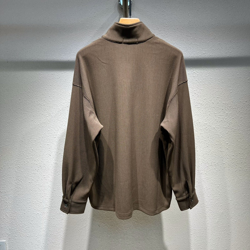 Side profile of Louis Vuitton luxury clothing with monogram-inspired silhouette