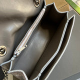 Side view of structured structured handbag