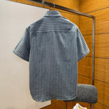 Christian Dior Denim Shirt – luxury designer piece at Bellvora