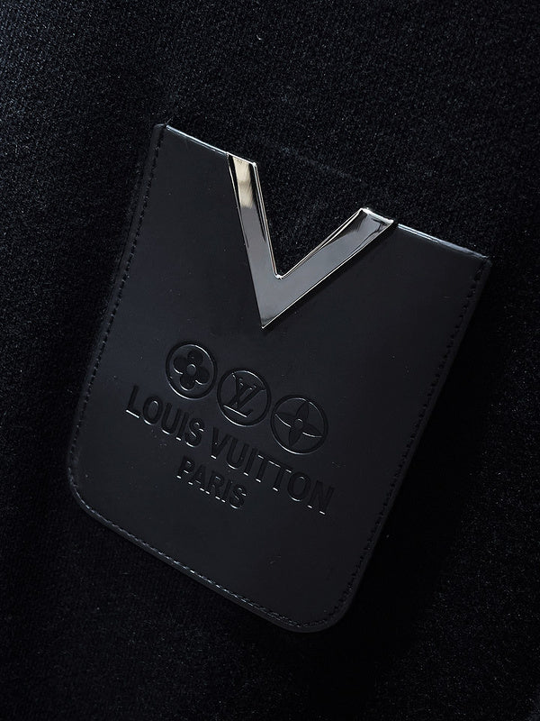 Flat lay presentation of Louis Vuitton luxury clothing with relaxed-fit cut