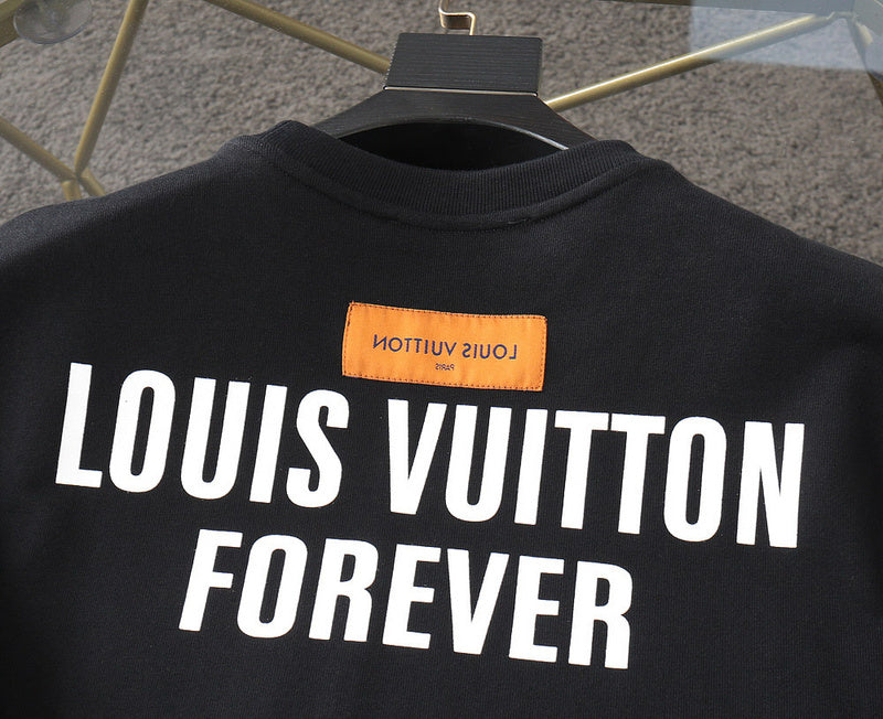 Front view of Louis Vuitton luxury clothing with tailored silhouette