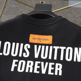 Front view of Louis Vuitton luxury clothing with tailored silhouette