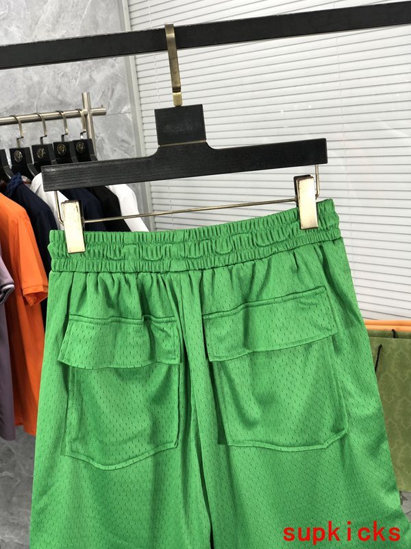 Front view of Rhude luxury clothing with monogram-inspired silhouette