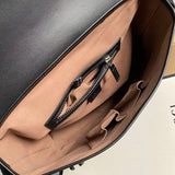 Close-up detail of refined structured women's handbag – women's luxury accessory