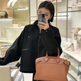  graceful top-handle bag detail view showing craftsmanship 20