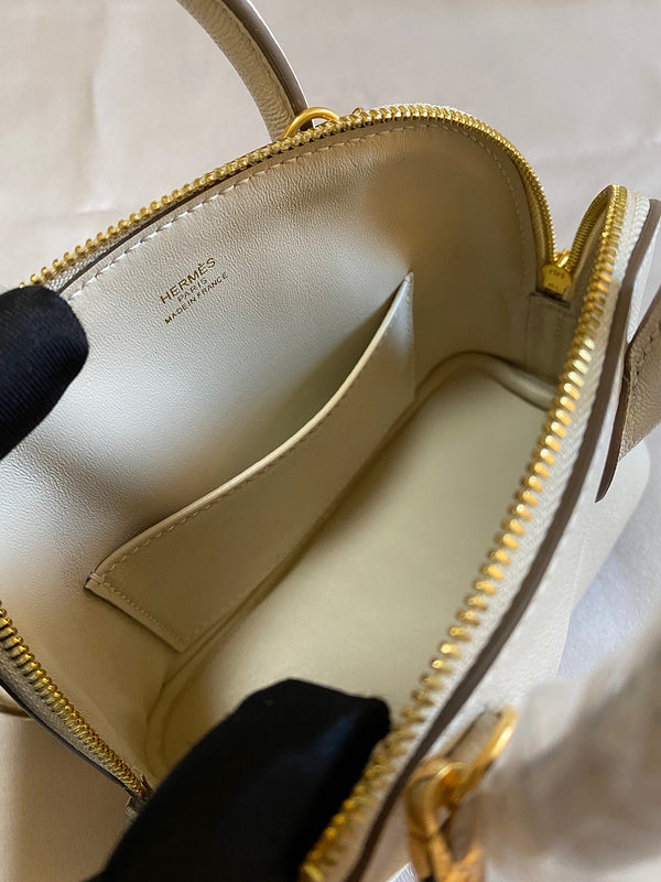 Side view of minimalist structured handbag
