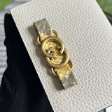 Styled lifestyle shot of classic elevated women's handbag – women's luxury accessory