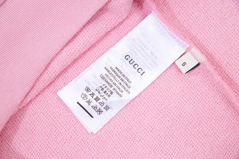 Close-up detail shot of Gucci luxury clothing with streetwear-inspired cut