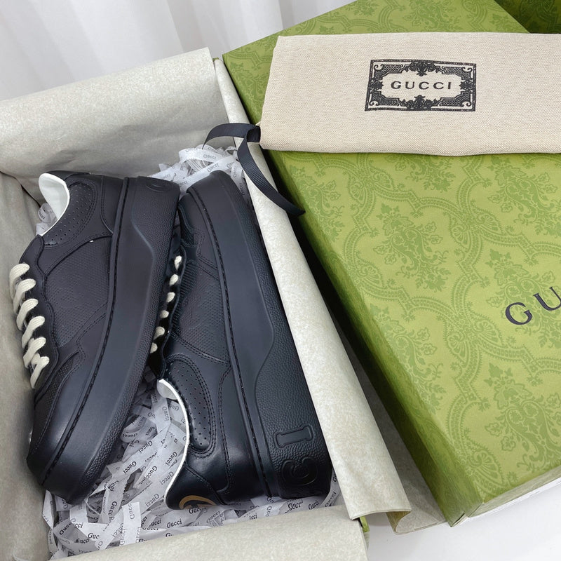 Side profile of Gucci clean off-white sneakers bold athletic profile