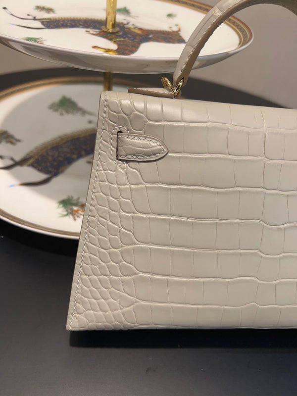 Side view of polished structured handbag