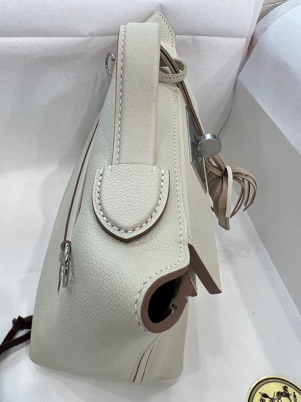 Side view of clean-lined structured handbag