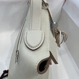 Side view of clean-lined structured handbag