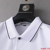Front view of Moncler luxury clothing with logo-detail design