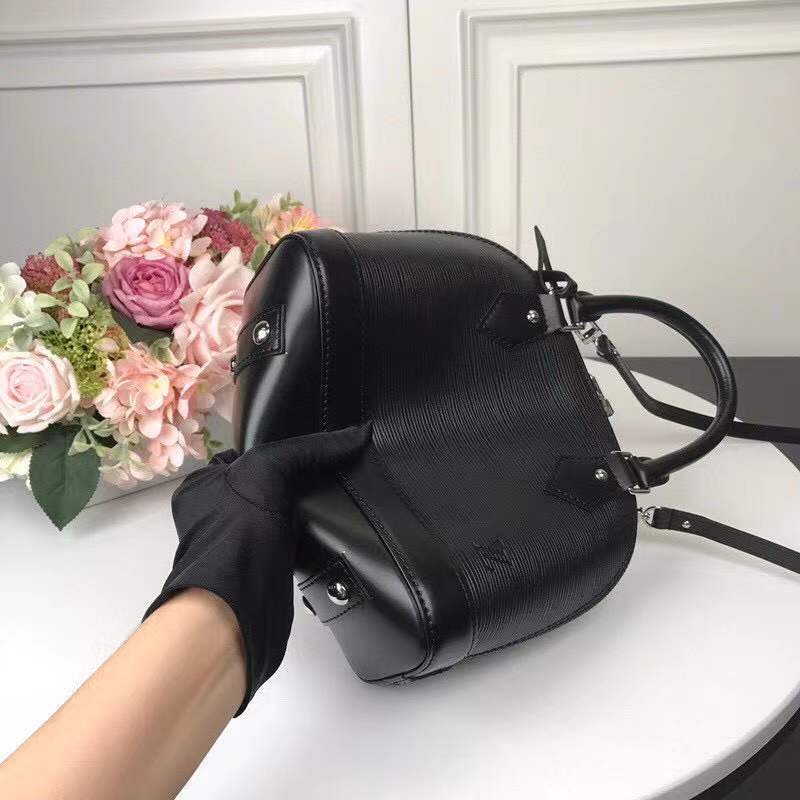 Top view of classic signature women's handbag – women's luxury handbag