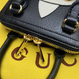Styled lifestyle shot of classic structured women's handbag – women's statement bag
