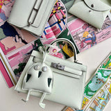  streamlined crossbody bag styled with outfit