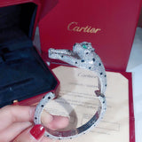 Close-up detail view of Cartier unisex jewelry piece