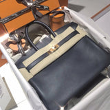 Side view of timeless structured handbag