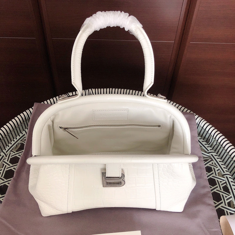 Side profile of elevated modern women's handbag – women's statement bag