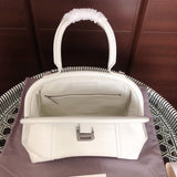Side profile of elevated modern women's handbag – women's statement bag