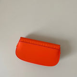 Close-up detail of statement sleek women's handbag – women's designer-style accessory