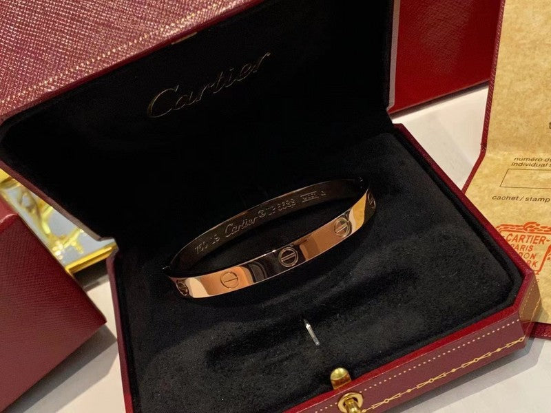 Close-up detail view of Cartier unisex jewelry piece