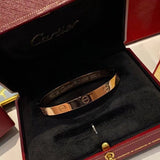 Close-up detail view of Cartier unisex jewelry piece