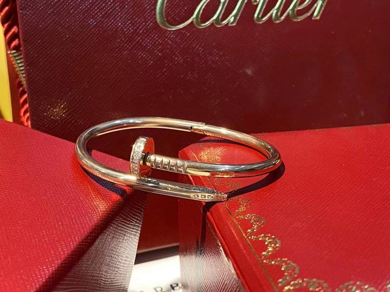 Side view of Cartier unisex jewelry piece