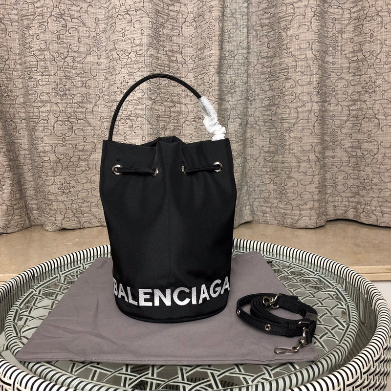 Front view of classic polished women's handbag – women's luxury accessory
