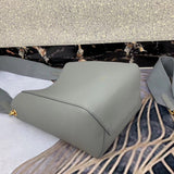 Handle and strap detail of elevated signature women's handbag – women's luxury handbag