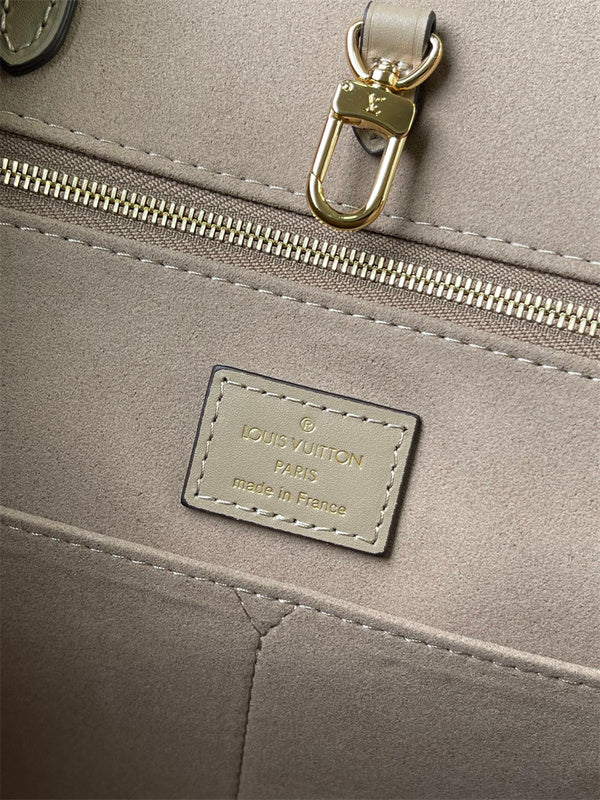 Signature shoulder bag carried on shoulder 28