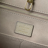  Signature shoulder bag carried on shoulder 28
