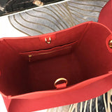 Close-up detail of statement modern women's handbag – women's statement bag