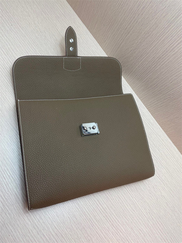  refined top-handle bag styled with outfit 24