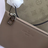 Side profile of premium everyday-luxe women's handbag – women's statement bag