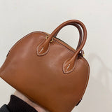 Side view of structured structured handbag