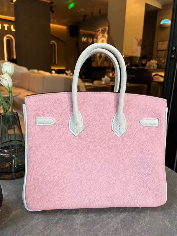 Side view of polished structured handbag