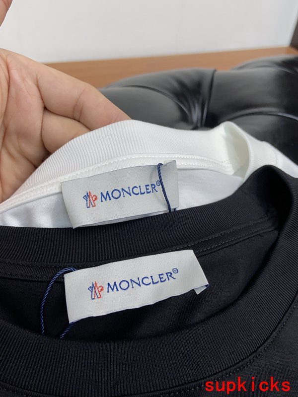 Back view of Moncler luxury clothing with contemporary cut