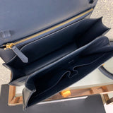 Front view of sleek elevated women's handbag – women's luxury handbag