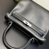 Side view of sophisticated structured handbag