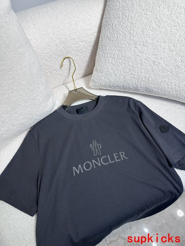 Side profile of Moncler luxury clothing with signature branding