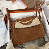 Side view of fluid structured handbag