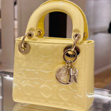 Handle and strap detail of structured signature women's handbag – women's designer-style accessory