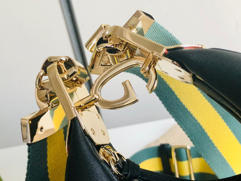 Styled lifestyle shot of elevated signature women's handbag – women's designer-style accessory