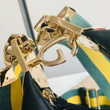 Styled lifestyle shot of elevated signature women's handbag – women's designer-style accessory
