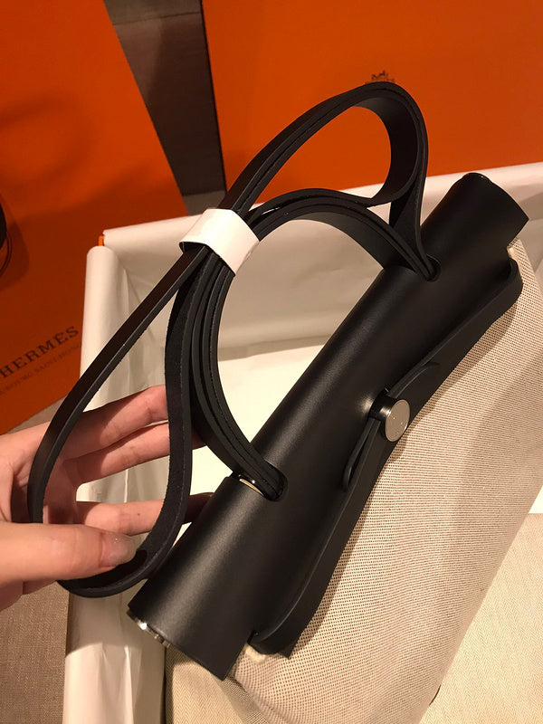 Side view of clean-lined structured handbag