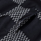 Side profile of Louis Vuitton luxury clothing with signature branding