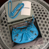 Top view of elevated modern women's handbag – women's luxury accessory